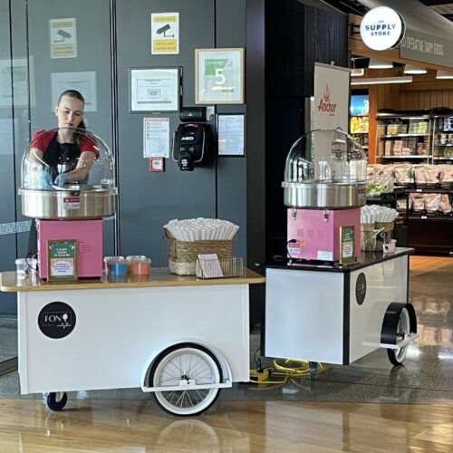 FON swirl artist spinning candy floss for guests.